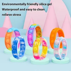 6 BRACCIALETTI ANTISTRESS ARCOBALENO BOLLE ARIA IN SILICONE GIOCO BAMBINI ADULTI