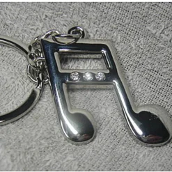 12 PORTACHIAVI BOMBONIERE CONFETTI A FORMA DI NOTA MUSICALA PER COMPLEANNO FESTE