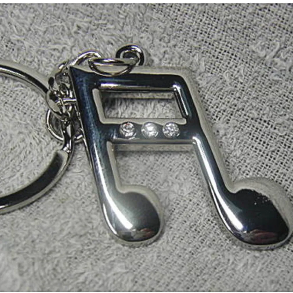 12 PORTACHIAVI BOMBONIERE CONFETTI A FORMA DI NOTA MUSICALA PER COMPLEANNO FESTE