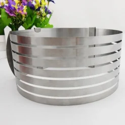 AFFETTATORTE TAGLIA AFFETTA TORTA REGOLABILE DA 24 30 CM STAMPO ANELLO ACCIAIO