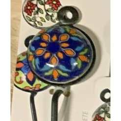 APPENDINO GANCIO PARETE APPENDIABITI METALLO CERAMICA DECORI ASS. 13X4CM 749346