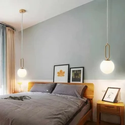 LAMPADARIO A SOSPENSIONE MINIMALISTA OVALE METALLO BRONZO CON SFERA VETRO G9 A96