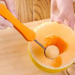 SCAVINO CUCCHIAIO MULTIFUNZIONE TAGLIO MELONE 3 IN 1 SPALLINATORE PER FRUTTA