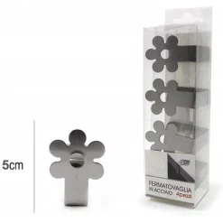 SET 4PZ FERMA TOVAGLIA FERMATOVAGLIA TAVOLA PLASTICA ACCIAIO FIORE CLIP GANCIO CASA